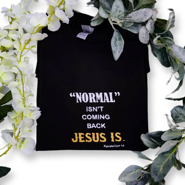 A black t-shirt with the text 'NORMAL ISN'T COMING BACK JESUS IS' embroidered in white and yellow across the front.jesus-revolution-tee