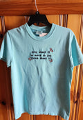 A blue t-shirt with the text 'pray about it as much as you think about it' printed on the front. pray-t-shirt