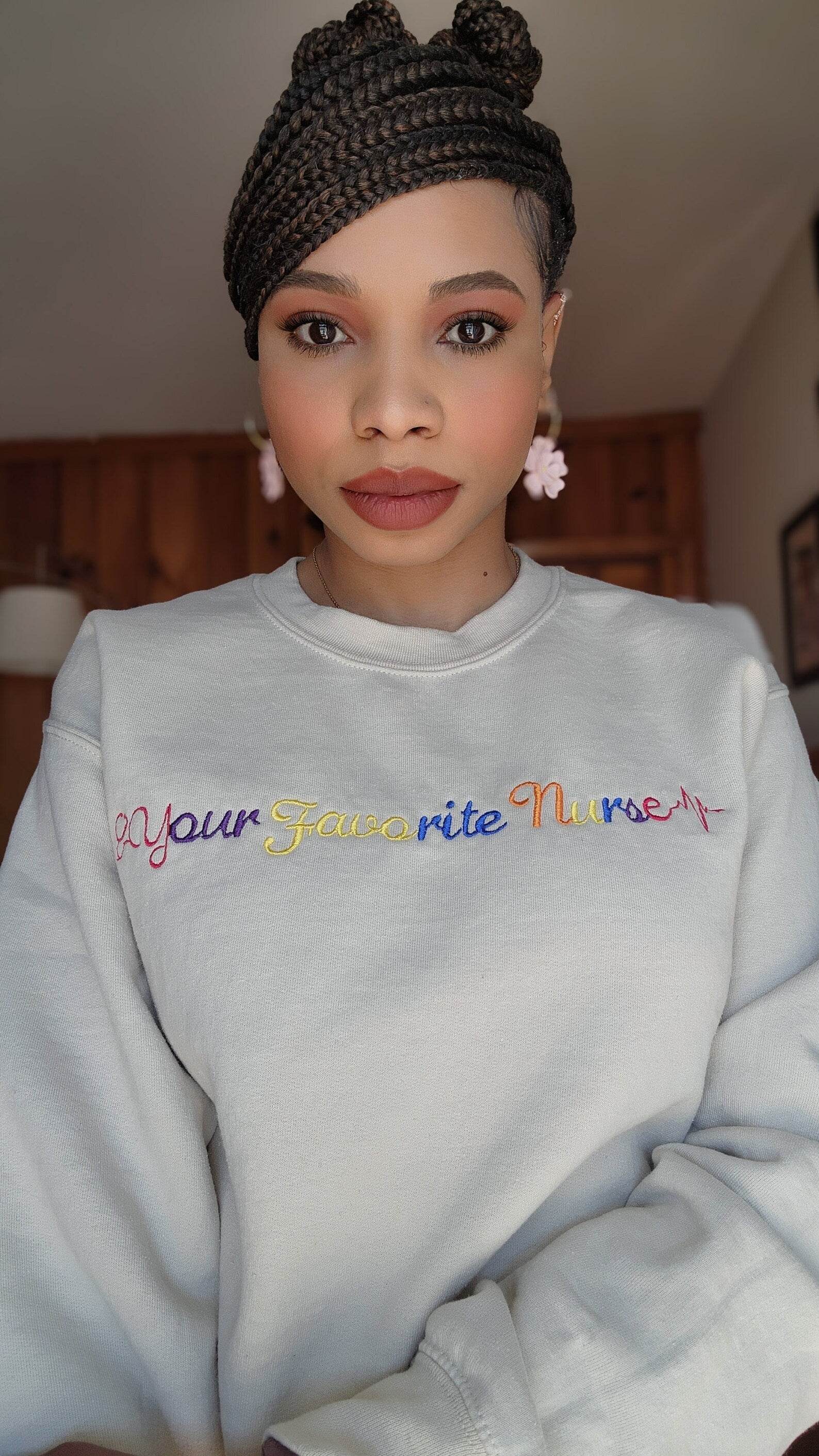 Stylish nurse-themed embroidered sweatshirt for women