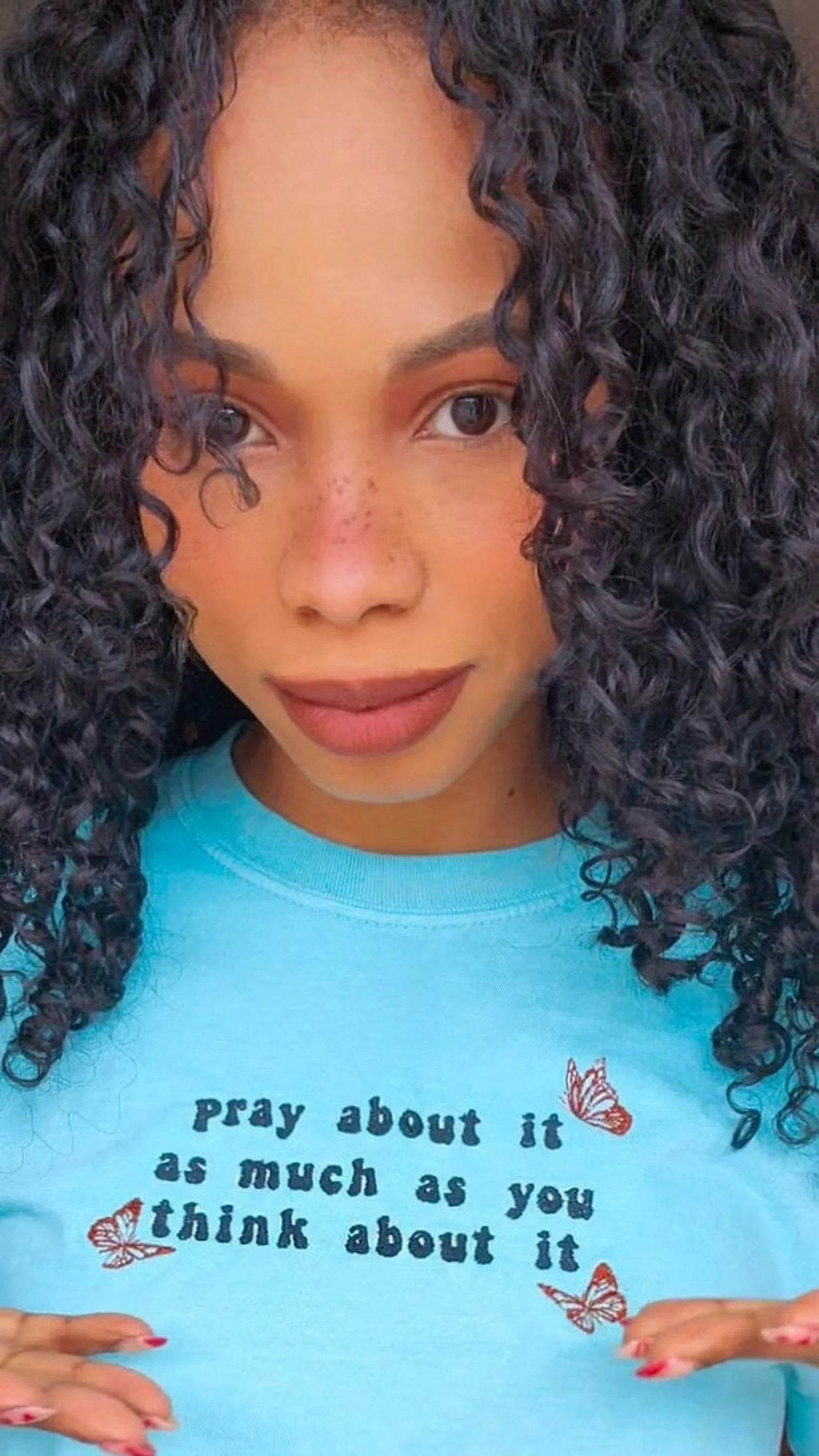 A blue t-shirt with the text 'pray about it as much as you think about it' printed on the front. pray-t-shirt