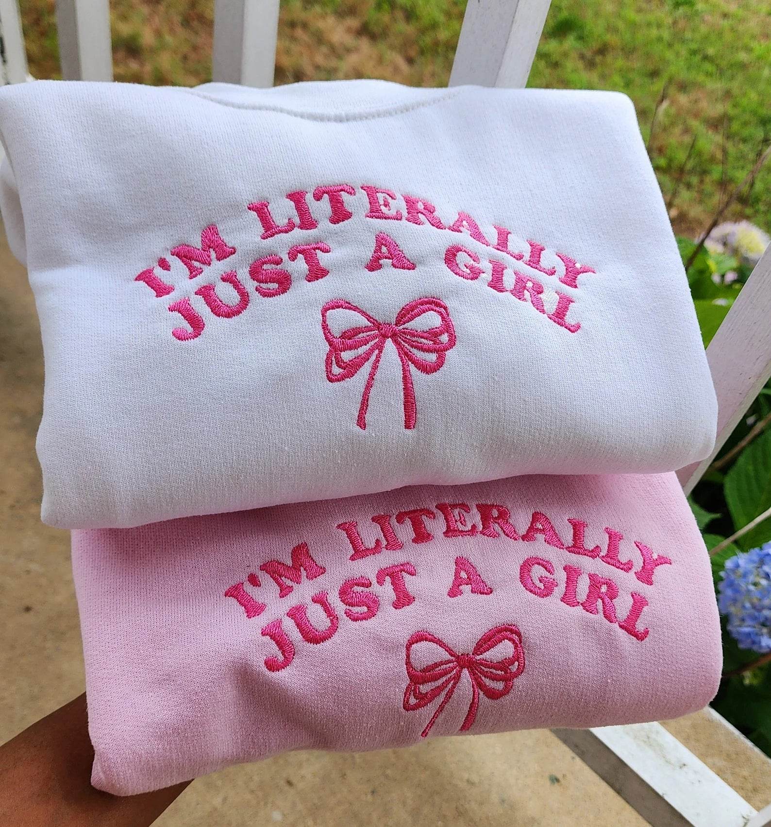 Cozy embroidered crewneck with I'm Just a Girl text