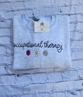 Cozy flower embroidered DPT sweatshirt for occupational therapists