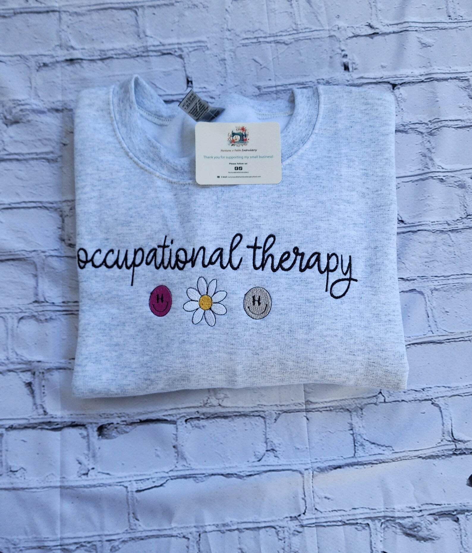 Cozy flower embroidered DPT sweatshirt for occupational therapists