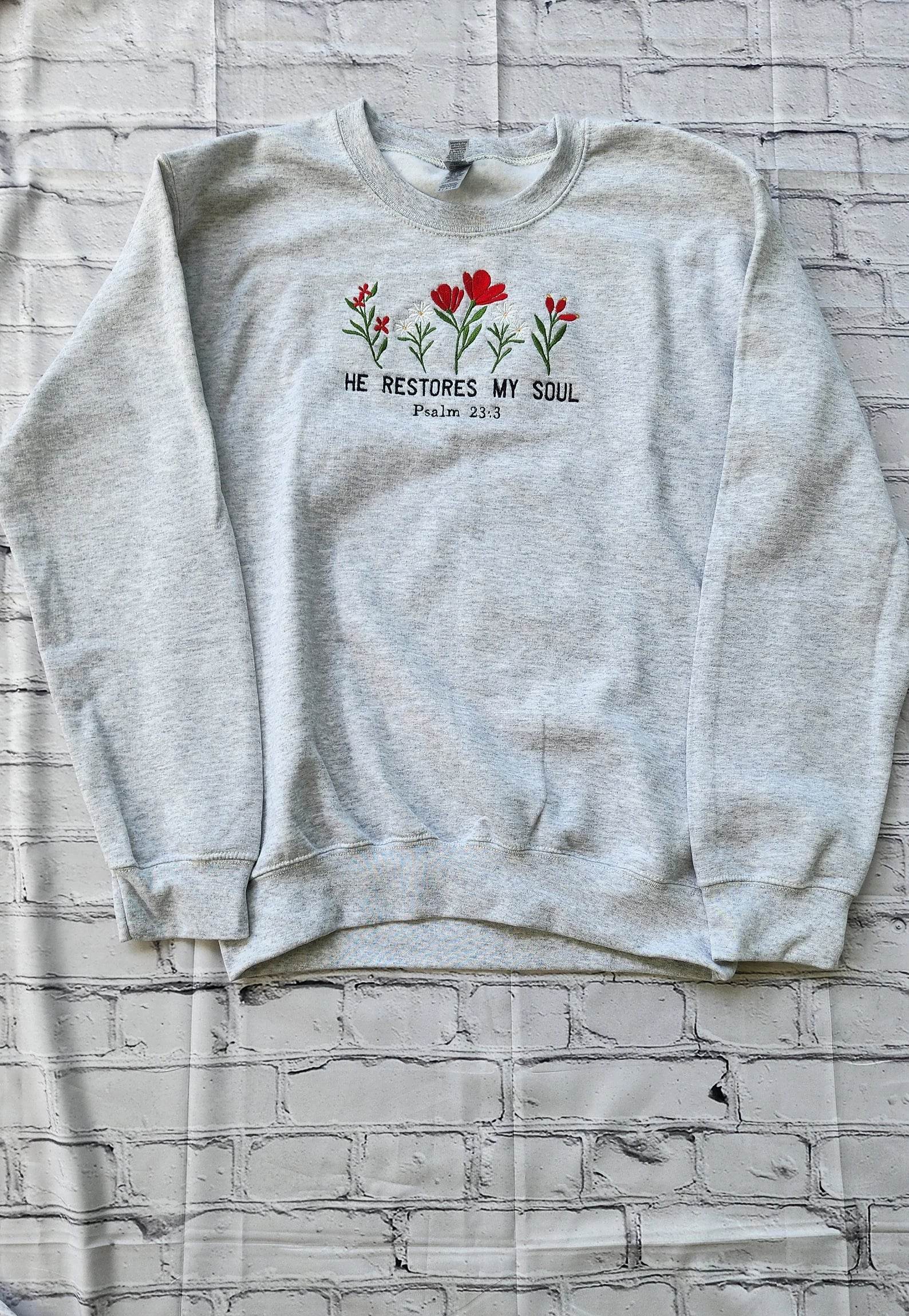 Stylish women’s sweatshirt with faith and floral design