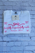 Cute bow detail on Psalm 139 women’s winter crewneck