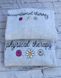 Trendy flower emoji sweatshirt for women in occupational therapy