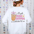 Casual women’s sweatshirt with iced coffee artwork