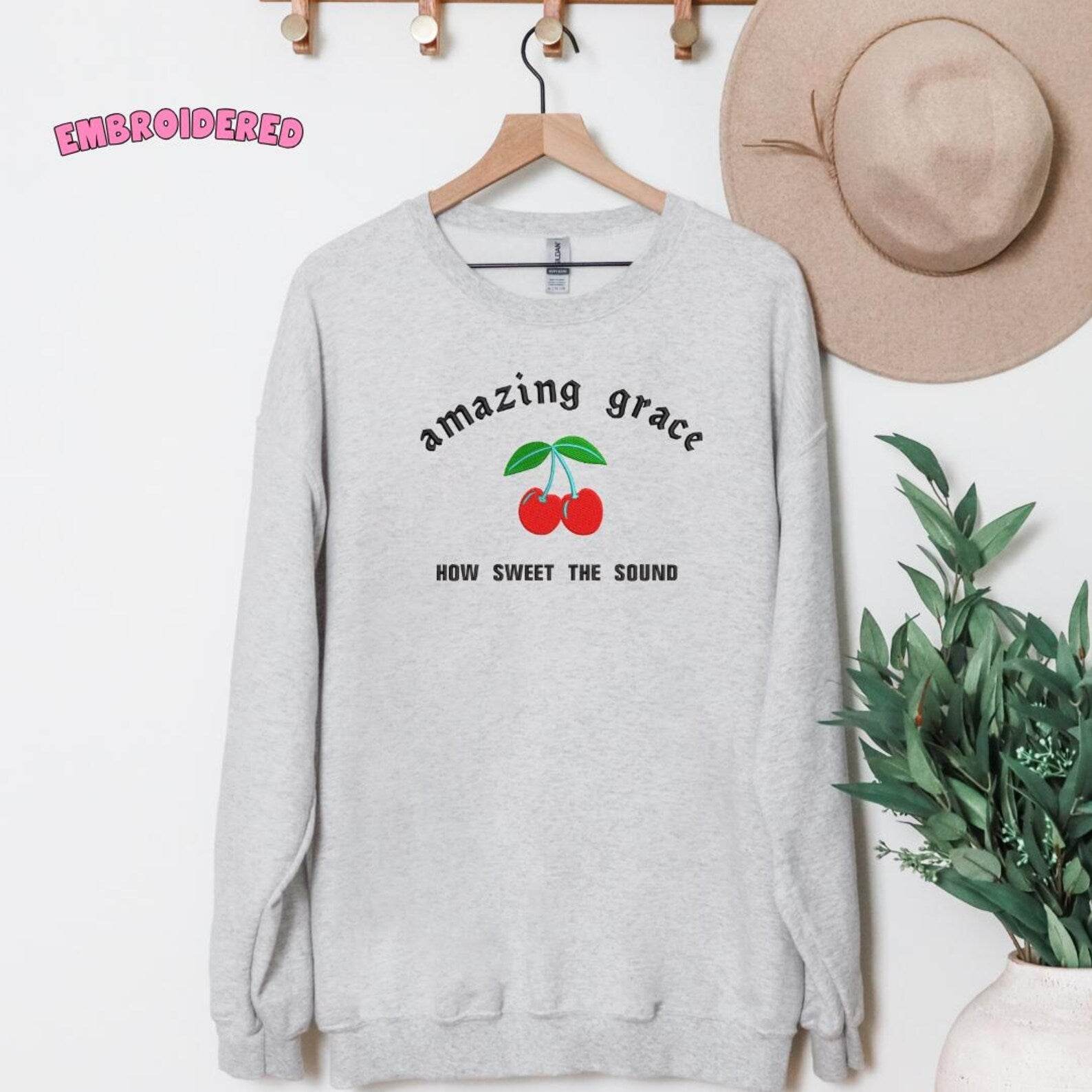 Amazing Grace Christian Crewneck Soft Sweatshirt hanging 