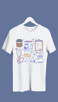 a sweatshirt with hand-drawn medical doodles including a stethoscope, syringe, band-aids, and a steaming cup of coffee.