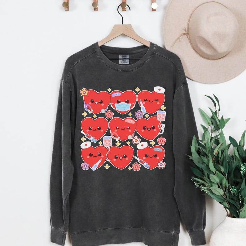 Trendy Nurse Heart Sweatshirt – Cozy Crewneck Shirt Black