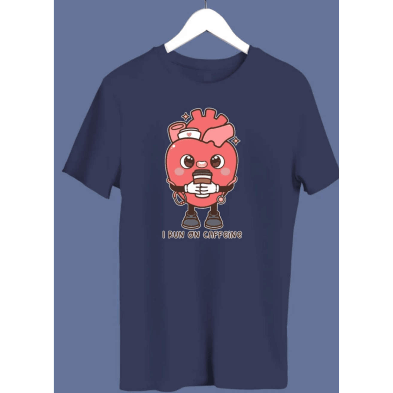 A navy blue crewneck sweatshirt with a graphic of an anatomical heart holding a coffee cup and the phrase 'I live on caffeine.'.